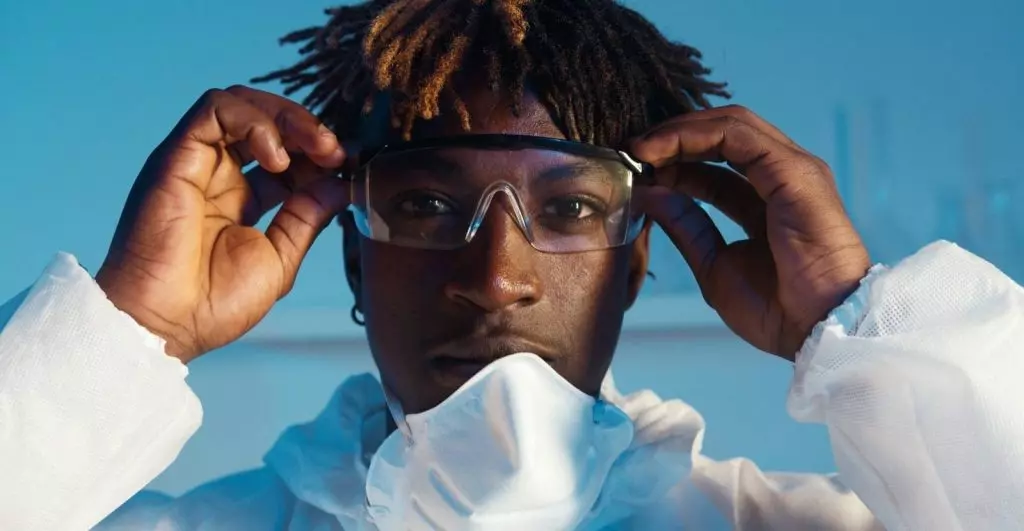 a man is wearing his glasses