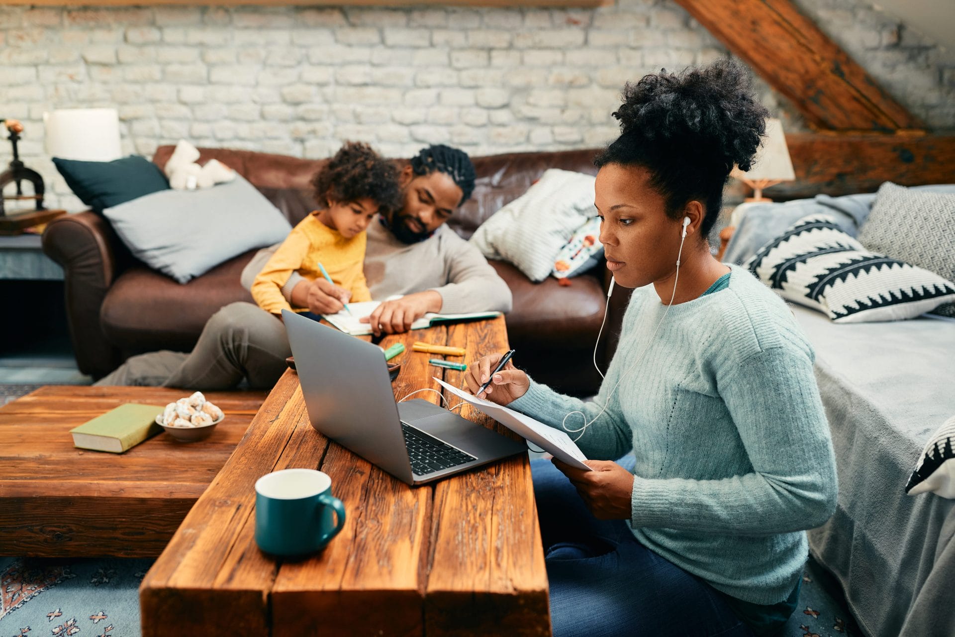 african-american-mother-having-conference-call-whi-2023-11-27-04-57-35-utc