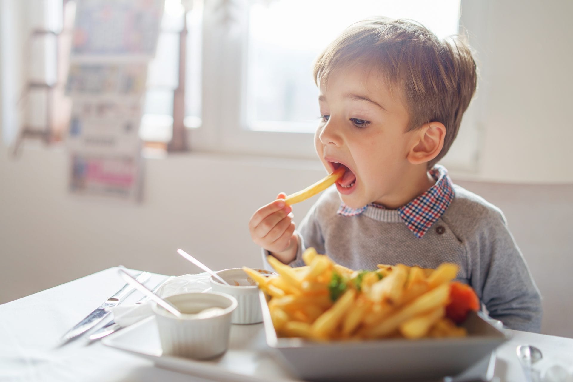 A young child eating
